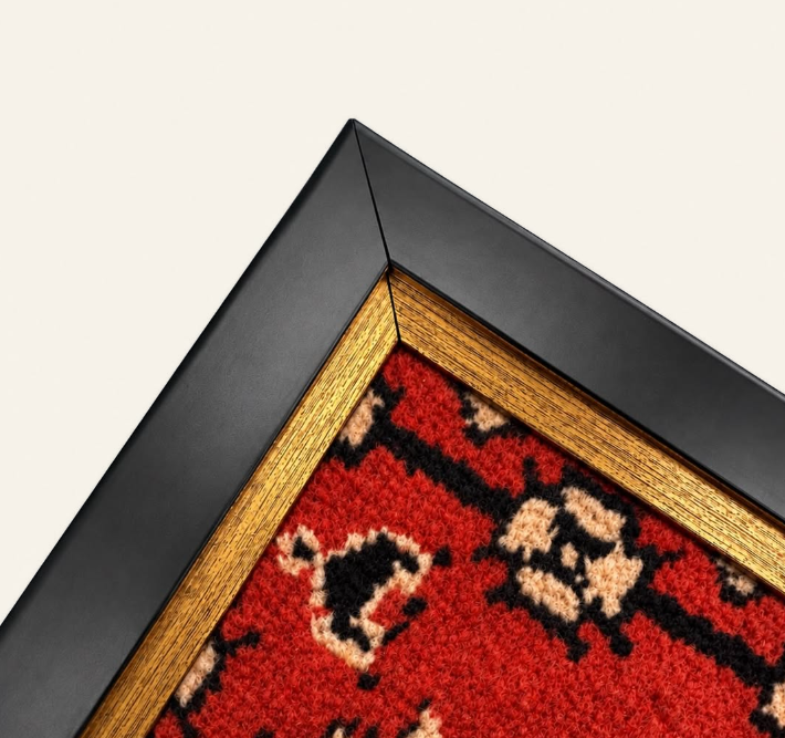 Red Azerbaijani carpet in a black and gold corner frame